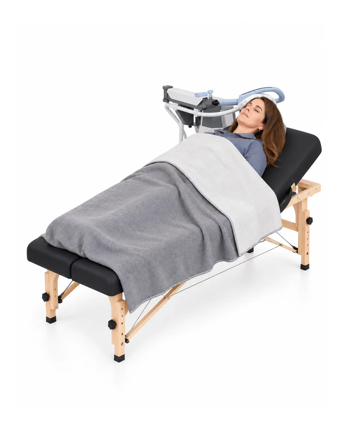 A woman reclining on a treatment bed with the EXOMIND coil positioned at her head